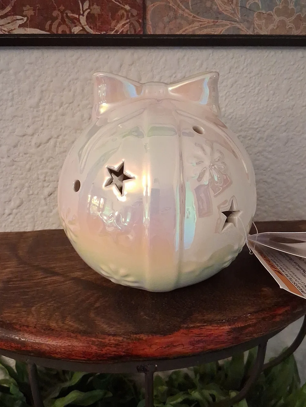 Iridescent White Ceramic Lantern with Star Cutouts and Bow Accent
